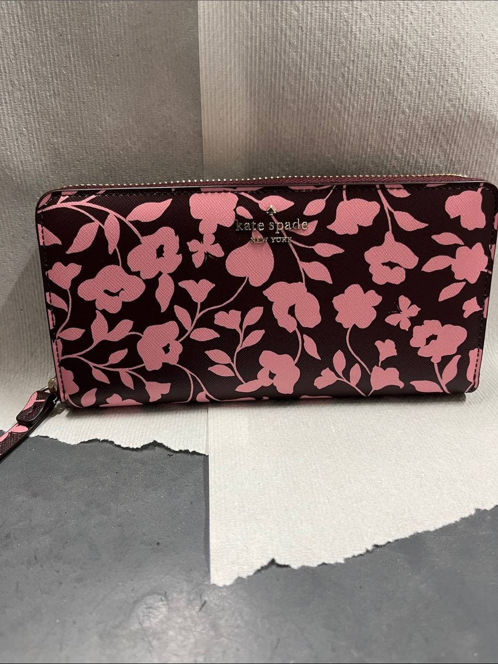 NWOT Kate Spade pink floral on dark maroon zip-around wallet